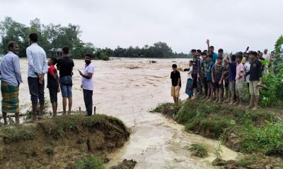 ঝিনাইগাতীতে পাহাড়ি ঢলে নদীর বাঁধ ভেঙে নিম্নাঞ্চল প্লাবিত