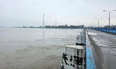 উজানের ঢল আর ভারী বৃষ্টিতে বাড়ছে তিস্তার পানি